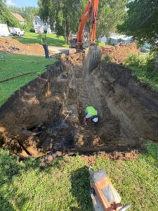 Crews install water service on 5th Street.
