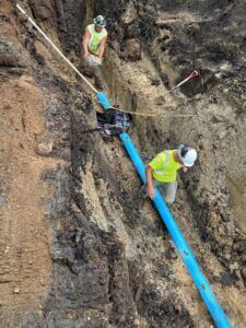 Crews install water main on 8th Avenue.